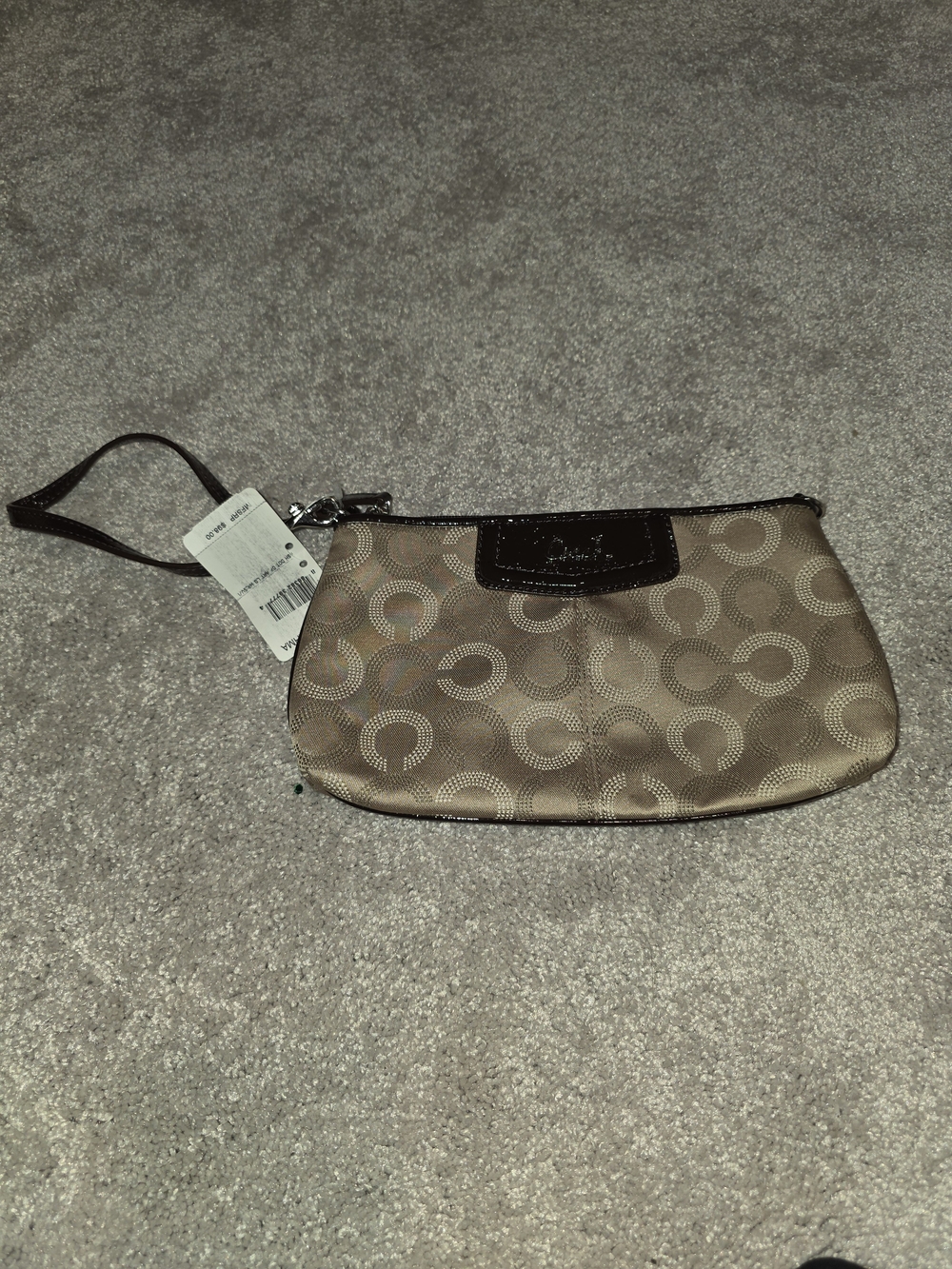 Coach Beige Signature Wristlet with Dark Trim